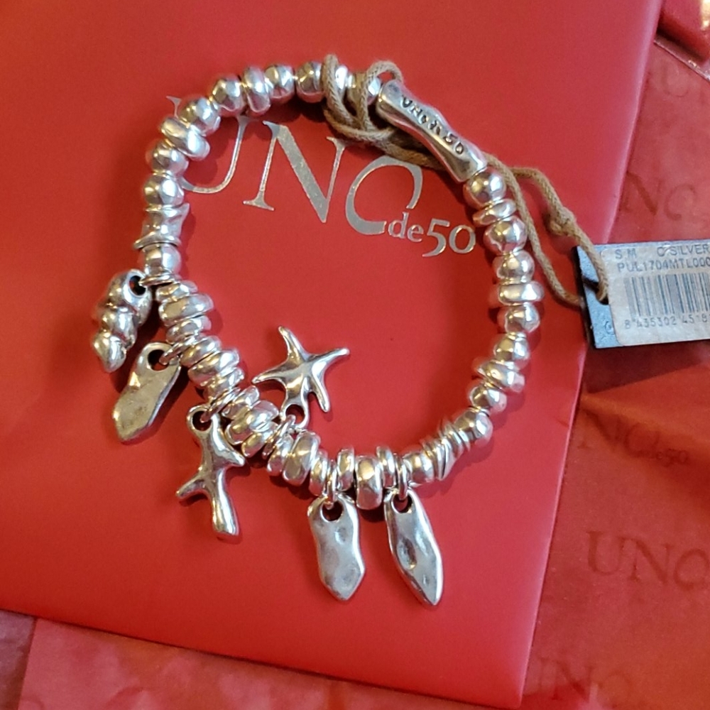 Unode50 stretch bracelet one size free silver and free adj bracelet with charms